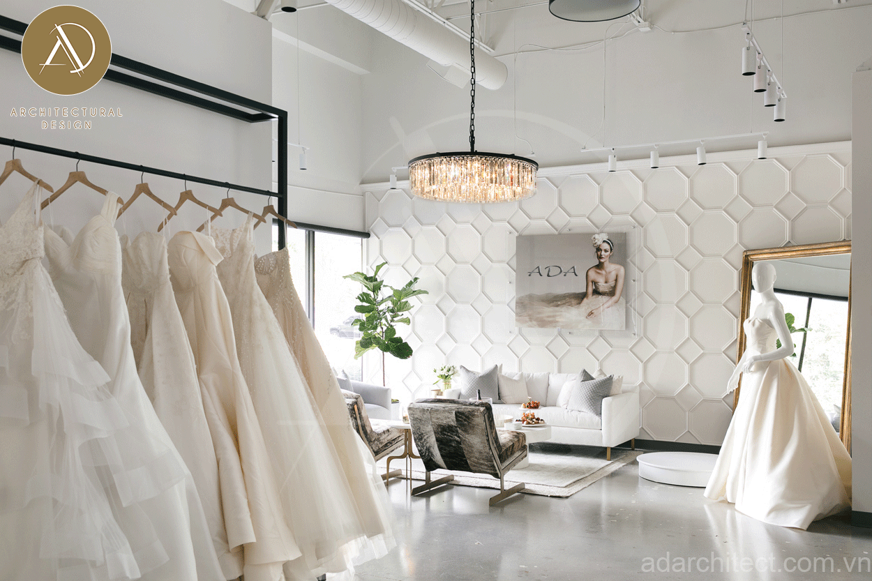 thiết kế tiệm áo cưới đẹp: ghế sofa nhỏ tiết kiệm chi phi mà còn gây cảm giác thân thiện cho khách hàng khi tư vấn