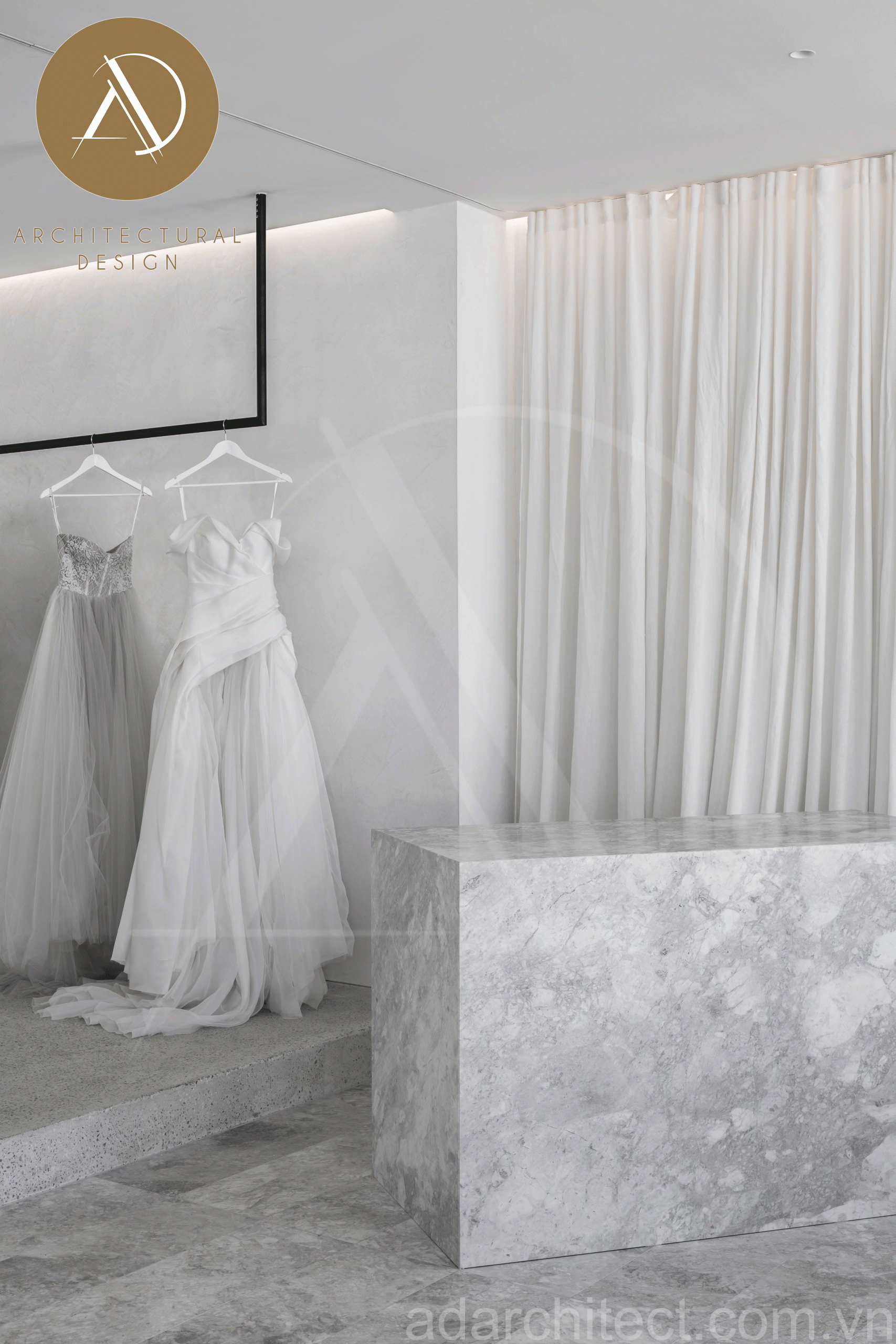 thiết kế tiệm áo cưới đẹp: quầy lễ tân nhỏ gọn cho showroom áo cưới tông xám lạ mắt