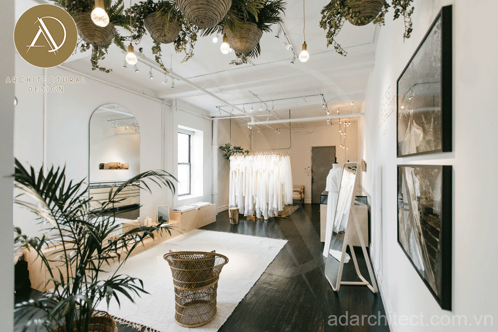 thiết kế tiệm áo cưới đẹp: trang trí thảm trắng giúp không gian ấm áp và chống trơn trượt